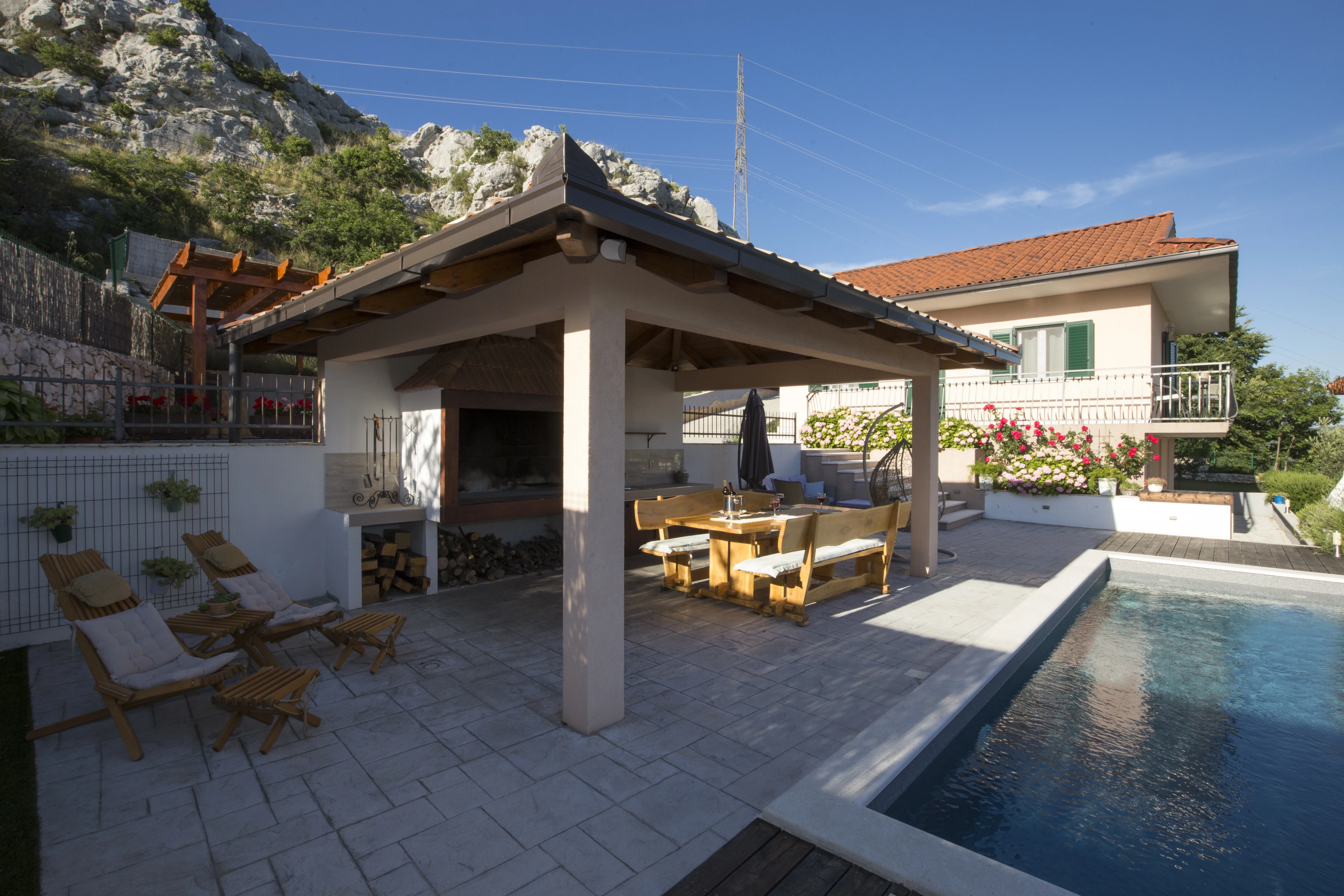 Covered BBQ terrace and pool